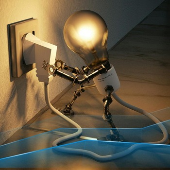 A picture of a cartoon man as a bulb inserting a plug into an electrical socket